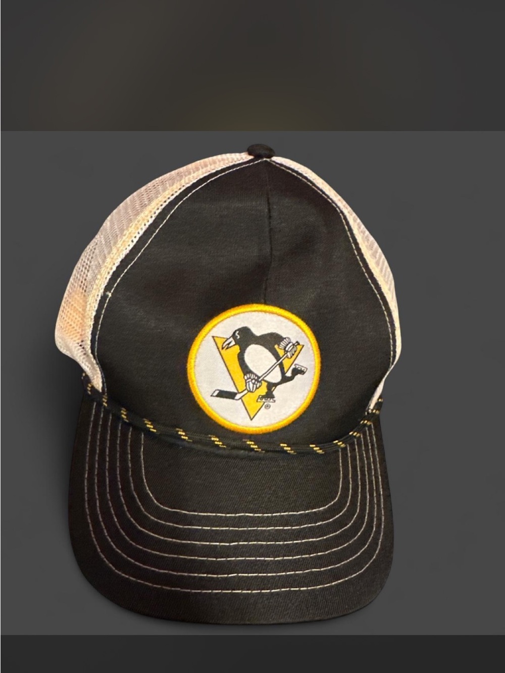 Black and Cream Trucker Hat with Yellow Logo Patch